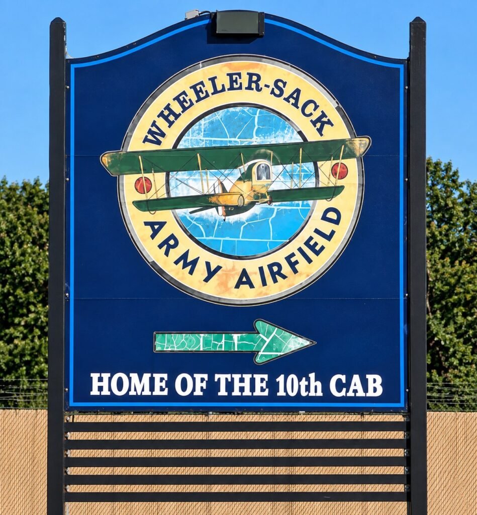 Wheeler-Sack Army Airfield entrance sign with vintage biplane emblem